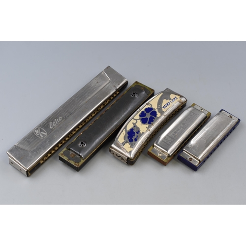 211 - Selection of five vintage Harmonica's including: Blues Harp, Johnson The Blues King and more