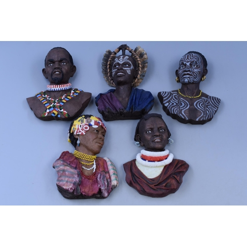 363 - A selection of Five African Tribe themed wall decorations (One a/f)