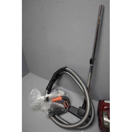 722 - Morrisons pull along vacuum cleaner with 2 hoses and accesories, working when tested