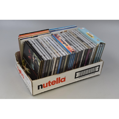 581 - Box of Music CD's including Nick cave, George Michael, Janet Jackson, Snow Patrol, Kings of Leon, Br... 