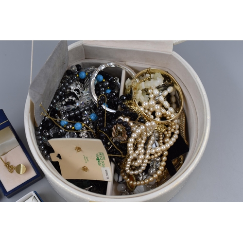 520 - A Selection of Unsorted Designer Jewellery, In Wicker Basket and Gold Shimmer Jewellery Box. Include... 