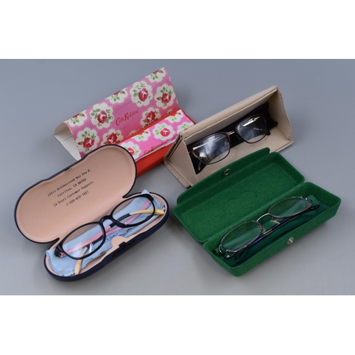 525 - Four Glasses Cases to include Contents of Pair of Designer Glasses Cases to include one pair of Expe... 