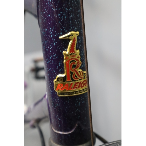 782 - A Raleigh Amazon 21 Speed Mountain Bike With Shimano Gears, In Speckled Purple. Sold As Seen. NO POS... 