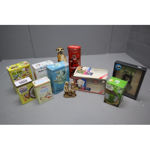 927 - Mixed Lot Including Collectible Cereal Promotional Tins, Meerkat Figurine and More