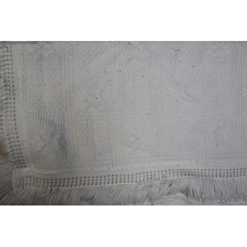 699 - Two single Royal Crest woven bedspread in cream, 180cm x 253cm