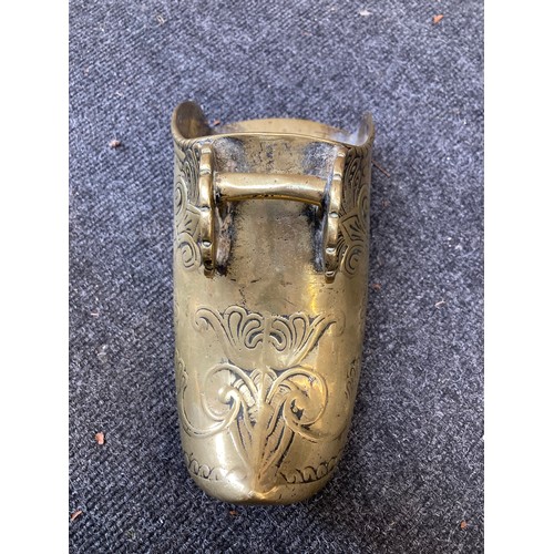 404 - Collection of brass items including a door knocker and two brass clogs (9