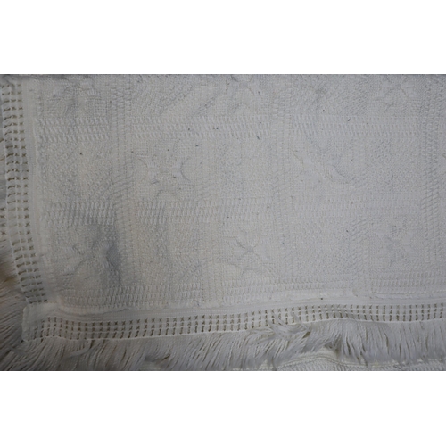 699 - Two single Royal Crest woven bedspread in cream, 180cm x 253cm