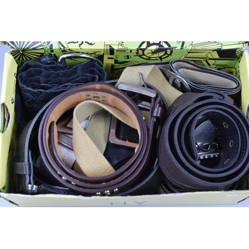 792 - A box full of various styled belts