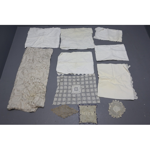 857 - Large selection of vintage linen and Irish lace including: Dollies, Bed linen, Table cloth and more