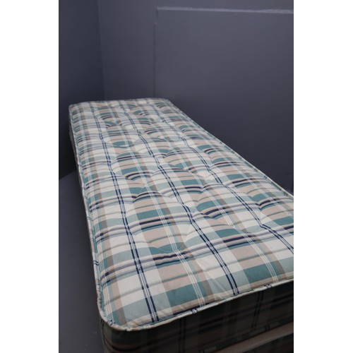 942 - New single divan bed with castors and green tartan with matching mattress 76