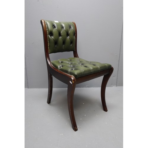 762 - Regency style desk chair in green buttoned leather. NO POSTAGE ON THIS ITEM