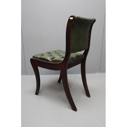 762 - Regency style desk chair in green buttoned leather. NO POSTAGE ON THIS ITEM