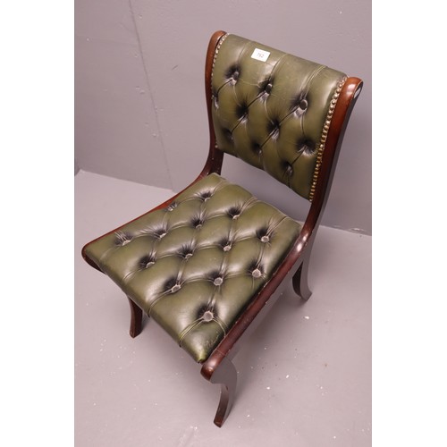 762 - Regency style desk chair in green buttoned leather. NO POSTAGE ON THIS ITEM