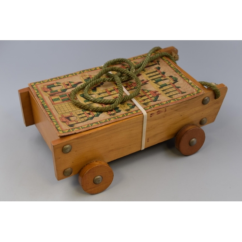 347 - Vintage childs wooden building block set in cart with original lid, 13