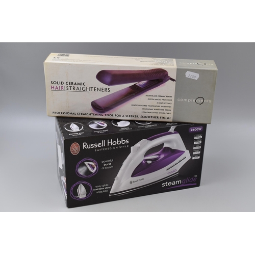 520 - Two Brand New Boxed Items to include a Russell Hobbs Steam Iron and a Compliments Silid Ceramic Hair... 