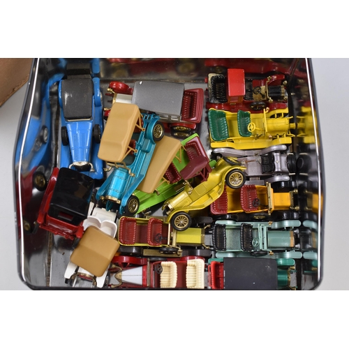 539 - Two boxes of collectables and playworn vehicles to include: A Warburtons die-cast model, 1909 Thomas... 