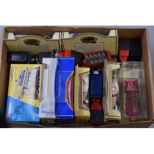 539 - Two boxes of collectables and playworn vehicles to include: A Warburtons die-cast model, 1909 Thomas... 