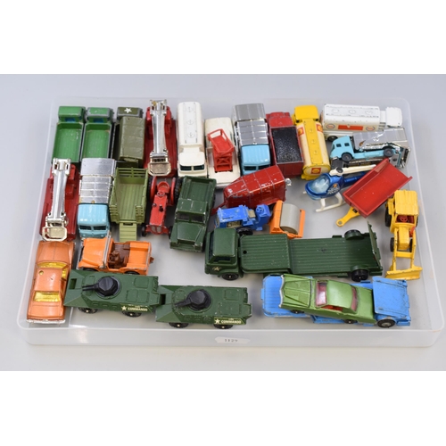 543 - A Selection of Twenty-Eight Husky and Corgi Juniors Die Cast Vehicles and Trailers