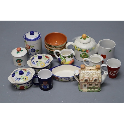 376 - Selection of brightly decorated ceramics to include tea pots, jugs lidded dishes and more