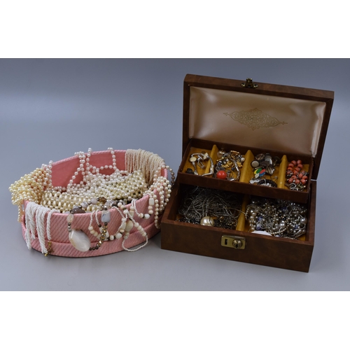 445 - Large mixed lot containing two jewellery boxes containing costume jewellery, to include bangles, cuf... 