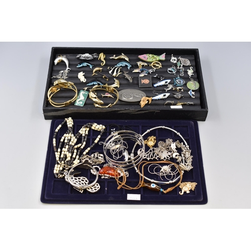 447 - A Large Selection of Sea Life/Nautical Themed Jewellery Pieces. Includes Dolphins, Shark, Sea Horses... 