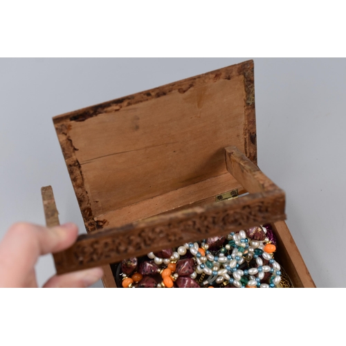 458 - Unsorted Jewellery In Wooden Hand Carved Box (As Found)