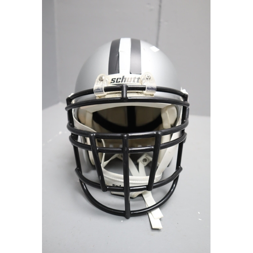 784 - A Set of American Football Protection (Schutt XL Helmet, And Diamond Shoulder Pads), With Bicycle He... 