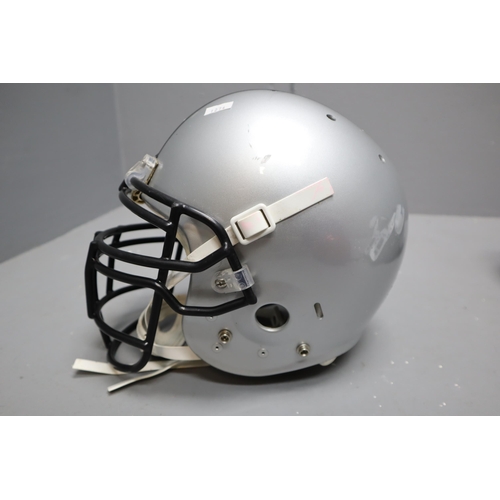 784 - A Set of American Football Protection (Schutt XL Helmet, And Diamond Shoulder Pads), With Bicycle He... 