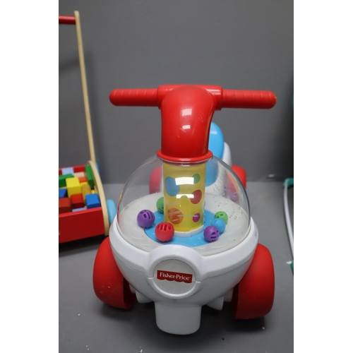 790 - Addo Wooden Blocks with Trolley, Fisher Pricen Ride On and a Baby Bouncer