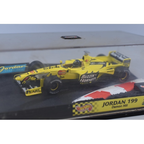 308 - Two Diecast Models to include Hot Wheels Jordan Grand Prix 199 - Damon Hill and a Burago Dode Viper ... 
