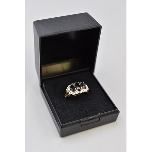 6 - Gold 375 (9ct) Clear and Black Stoned Ring Complete with Presentation Box