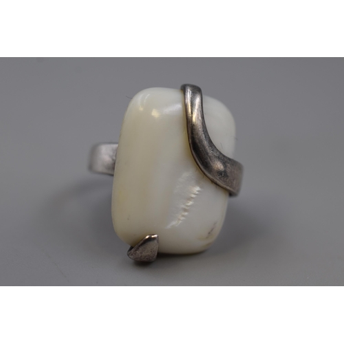 11 - A Hallmarked 925. Silver Mother of Pearl Stoned Ring, Size N