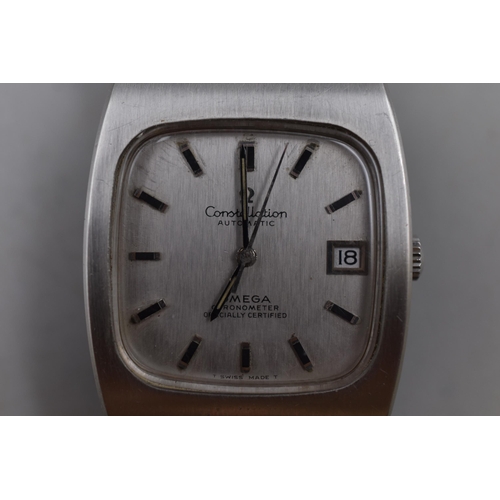 36 - A 1970's Omega Constellation Automatic Gents Watch, With Original Strap. In Working Order, Box Isn't... 