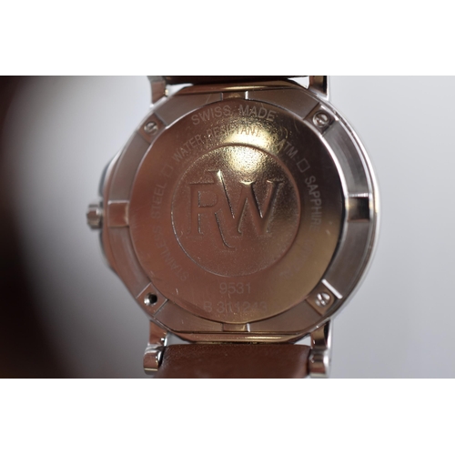 44 - A Raymond Weil Geneve Parsifal Gents Quartz Watch, With Leather Strap and Champagne Face. With Origi... 