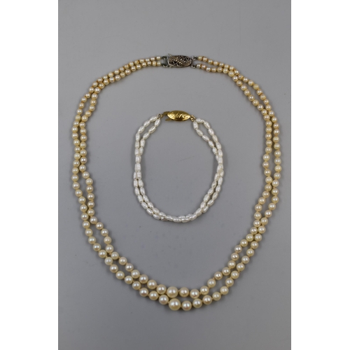 233 - A Sterling Silver Clasped Two Strand Pearl Necklace, With Gold on Silver Clasped Two Strand Pearl Br... 