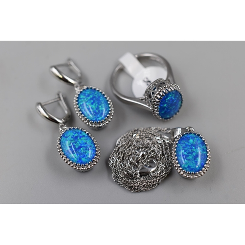 61 - A 925. Silver Australian Blue Opal Stoned Jewellery Set (Ring, Earrings, And Pendant Necklace)