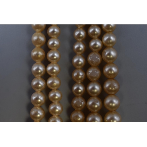 84 - Two Rosita Pearl Necklaces. Includes Two Strand Silver Clasped and Three Strand Necklace