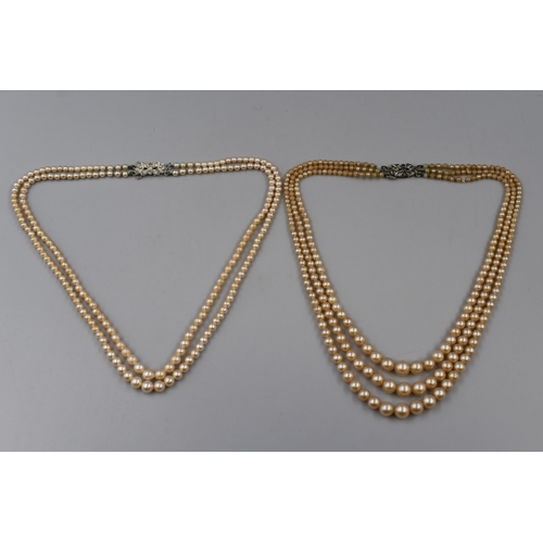 84 - Two Rosita Pearl Necklaces. Includes Two Strand Silver Clasped and Three Strand Necklace