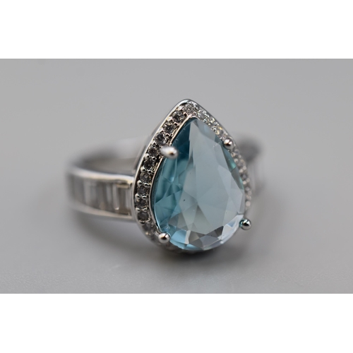 86 - A Teardrop Blue Stoned 925. Silver Ring, In Presentation Box