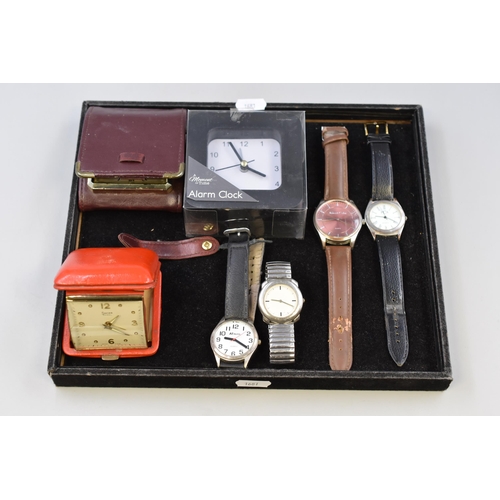 87 - Collection of Time Pieces To Include Four Quartz Wrist Watches ( All Working ) And Three Travel Cloc... 