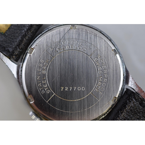 103 - A Garrard Mechanical Gents Watch (727700), With Leather Strap. In Working Order