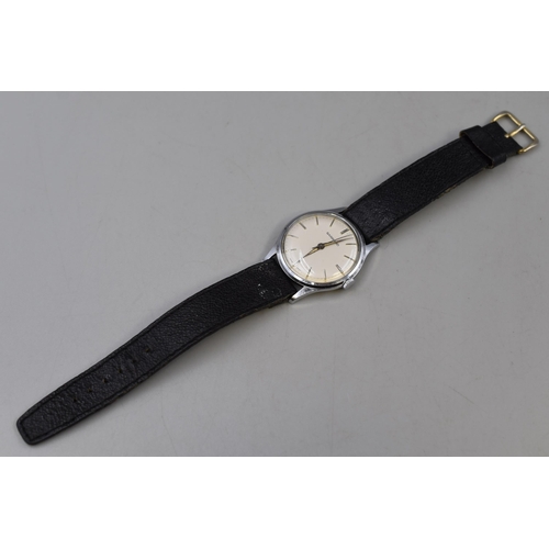 103 - A Garrard Mechanical Gents Watch (727700), With Leather Strap. In Working Order