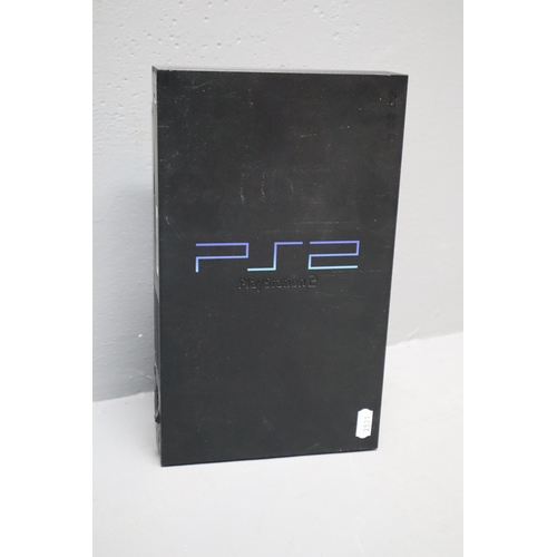 576 - Playstation 2 (no leads, powers on when tested, unboxed)