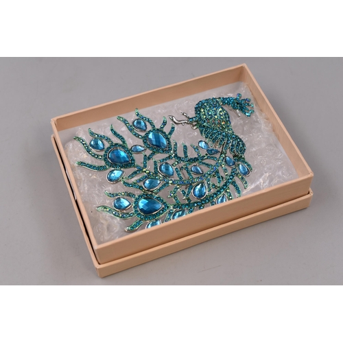 122 - Kirks Folly Large Teal Rhinestone Peacock Broach with Original Presentation Box