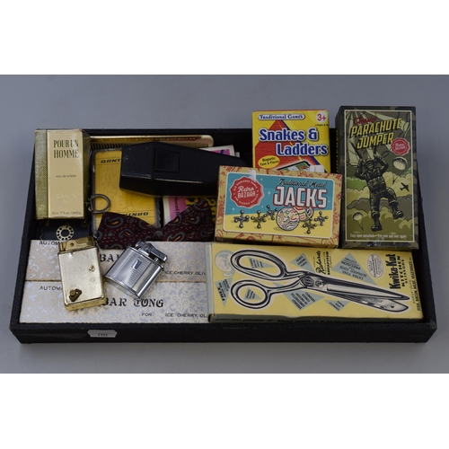 136 - Vintage items to include a Mosda 500 lighter, Crown musical lighter, games, playing cards, remote, b... 