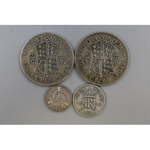 141 - Two George VI Silver Half Crowns, Sixpence and a George V 1932 Threepence