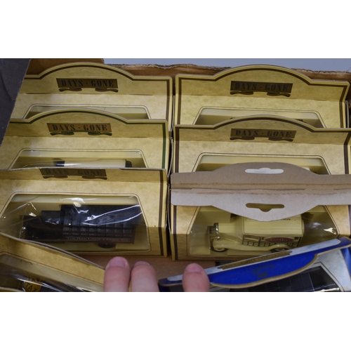 634 - Mixed boxed of 15 model die cast trucks/busses Lledo