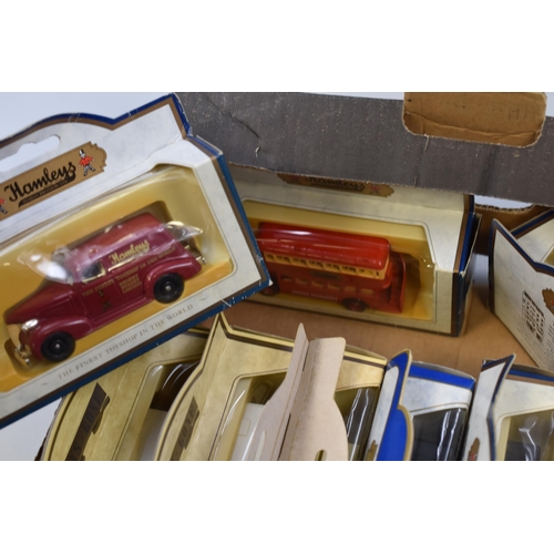 634 - Mixed boxed of 15 model die cast trucks/busses Lledo