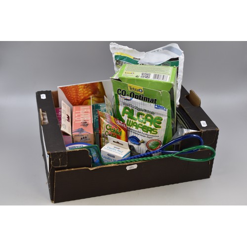 649 - A Selection of Aquarium Accessories To Include Filter, Food, Ammonia, And More