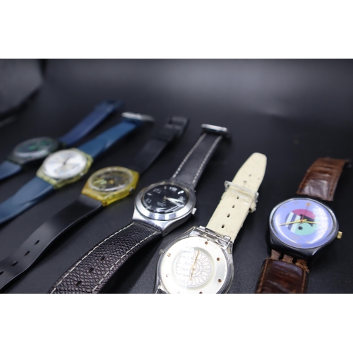 168 - A collection of six Swatch watches (some a/f)